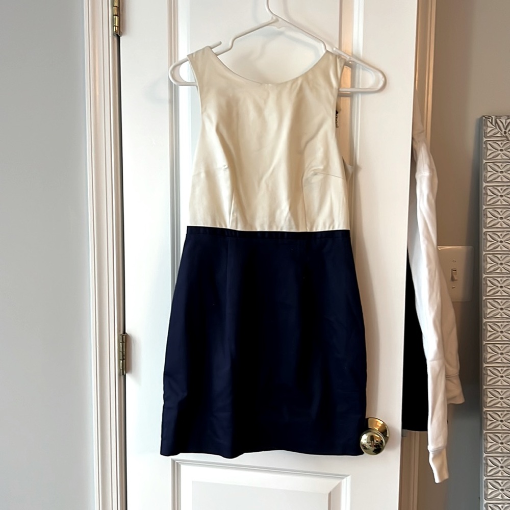 Adorable open back dress!